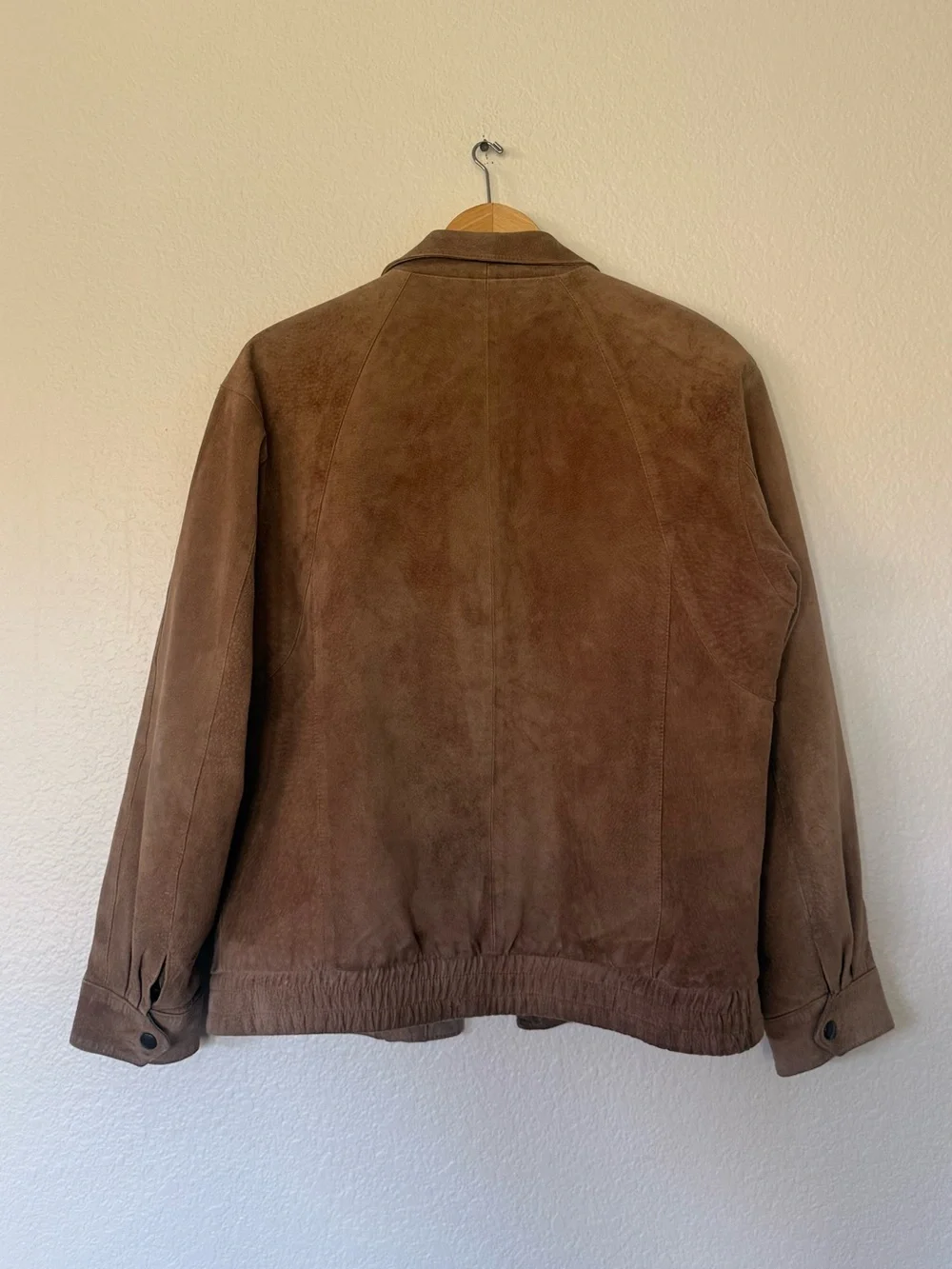 Tan leather bomber jacket
